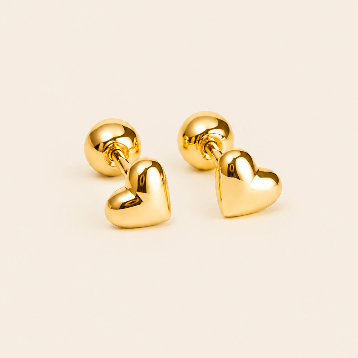 ARETES ABRIDORES CORAZÓN REVERSIBLE 18K